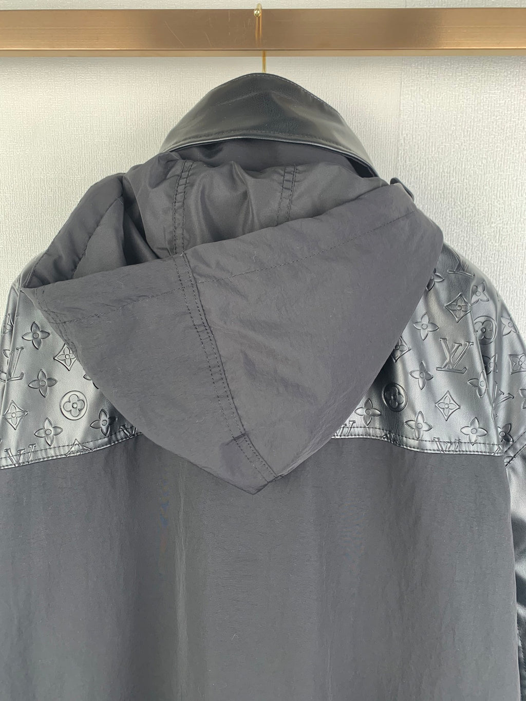 Louis Vuitton long hooded jacket with large hood and monogram trim