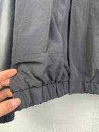 Louis Vuitton long jacket hem with gathered elastic at the bottom edge