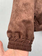 Dark brown monogram zip-up hooded jacket sleeve cuff with elastic ribbed trim
