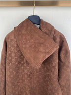 Dark brown monogram zip-up hooded jacket with structured hood and front zipper