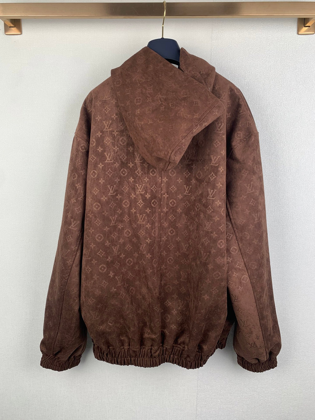 Louis Vuitton hooded zip jacket with monogram pattern on back, ribbed hem