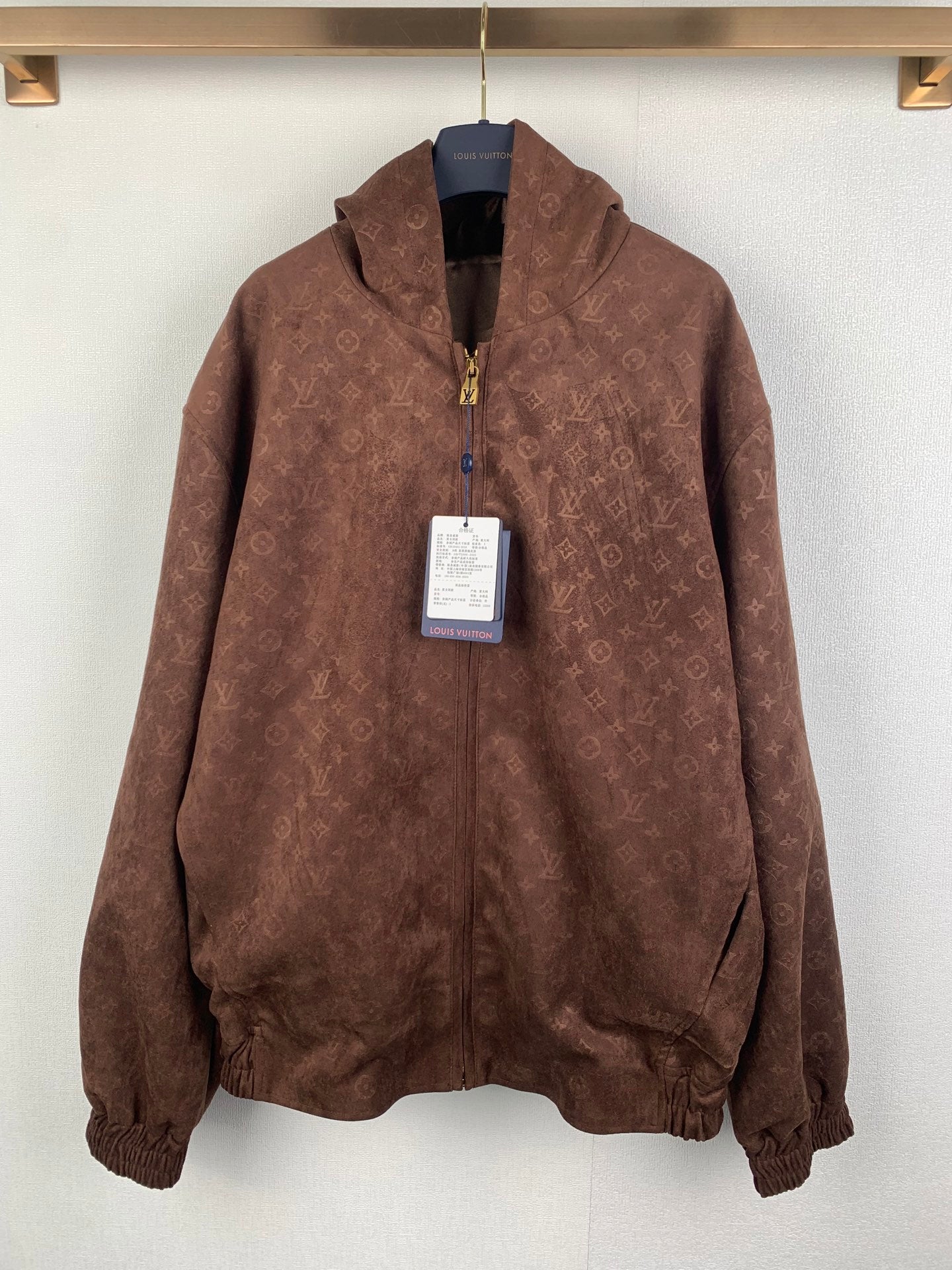 Louis Vuitton monogram zip-up hooded jacket in dark brown with ribbed cuffs and hem