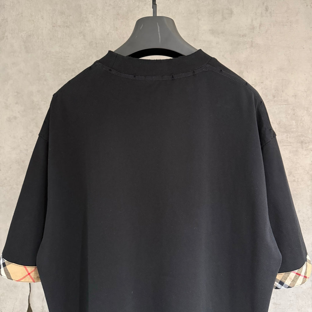 Black crewneck T-shirt with ribbed collar, back view