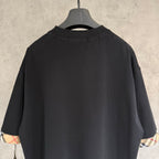 Black crewneck T-shirt with ribbed collar, back view