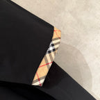 Black T-shirt with Burberry check-pattern sleeve cuff trim