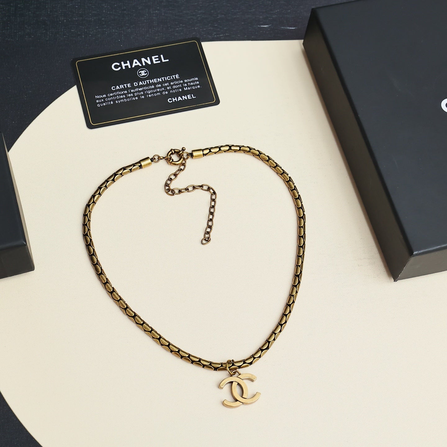 Gold-tone Chanel logo chain necklace with pendant and clasp