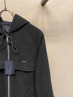 Prada zip jacket chest area with hood, drawcord, and hanging size tag, dark color