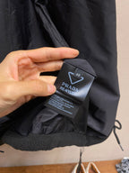 Prada Re-Nylon care label inside hooded jacket with drawstring cord