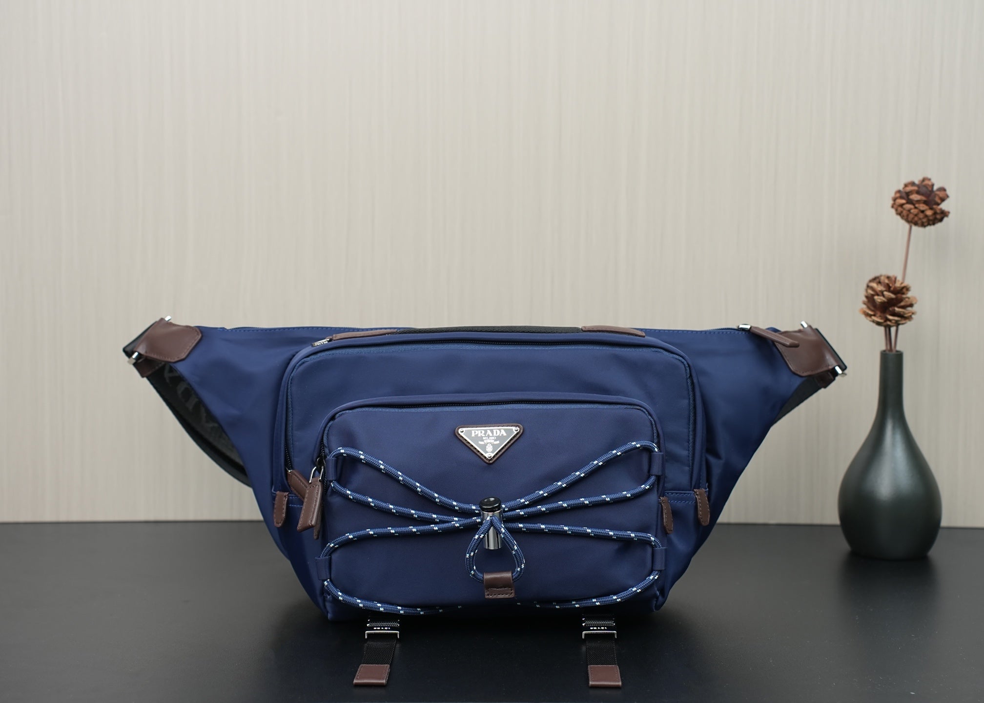 Prada dark-blue nylon crossbody bag with top zip and front patch pocket