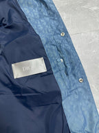 Blue long puffer vest with Dior logo label on inner chest