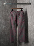Gucci pants with elastic drawstring waist, maroon and gray GG-pattern woven fabric
