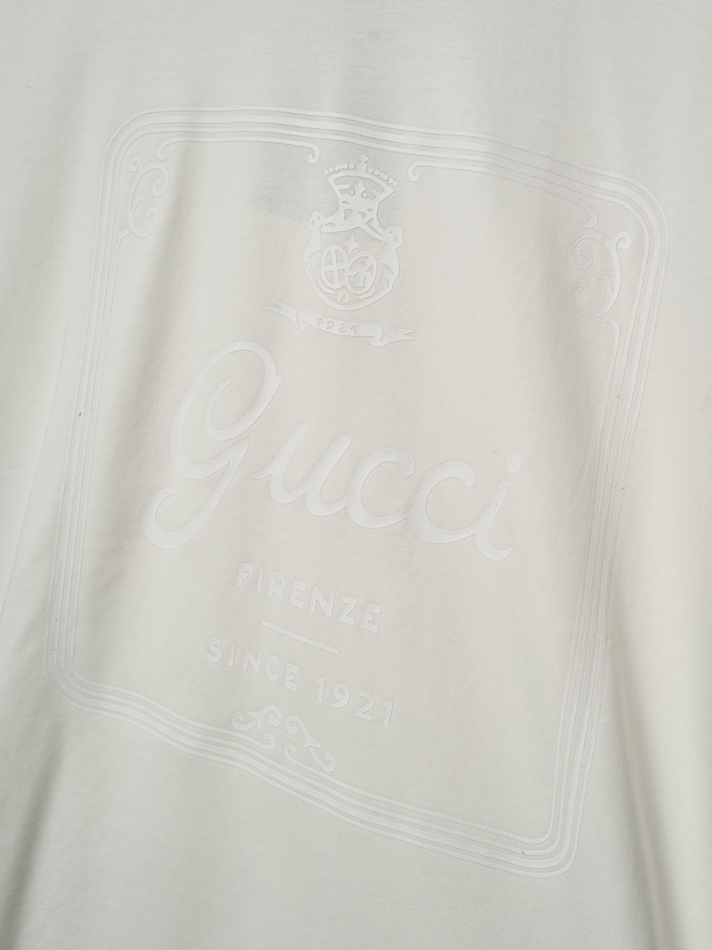 Light cream Gucci T-shirt with embossed logo and script on the chest