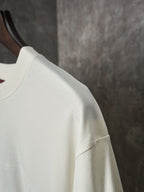 Light cream Gucci T-shirt shoulder and sleeve seam detail