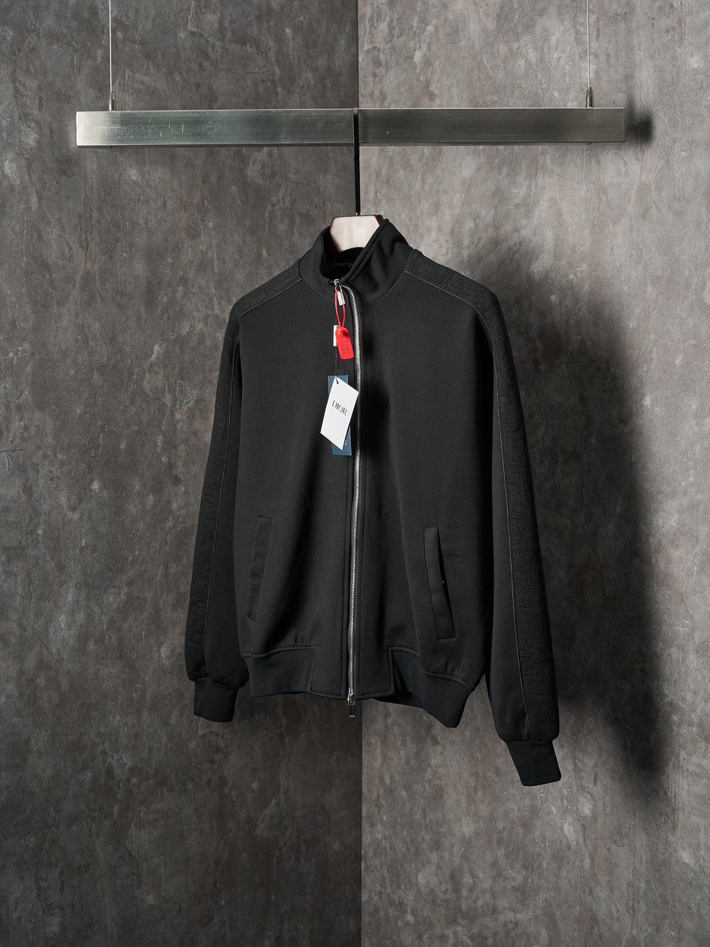 Black Dior zip-up bomber jacket with stand collar and zip front