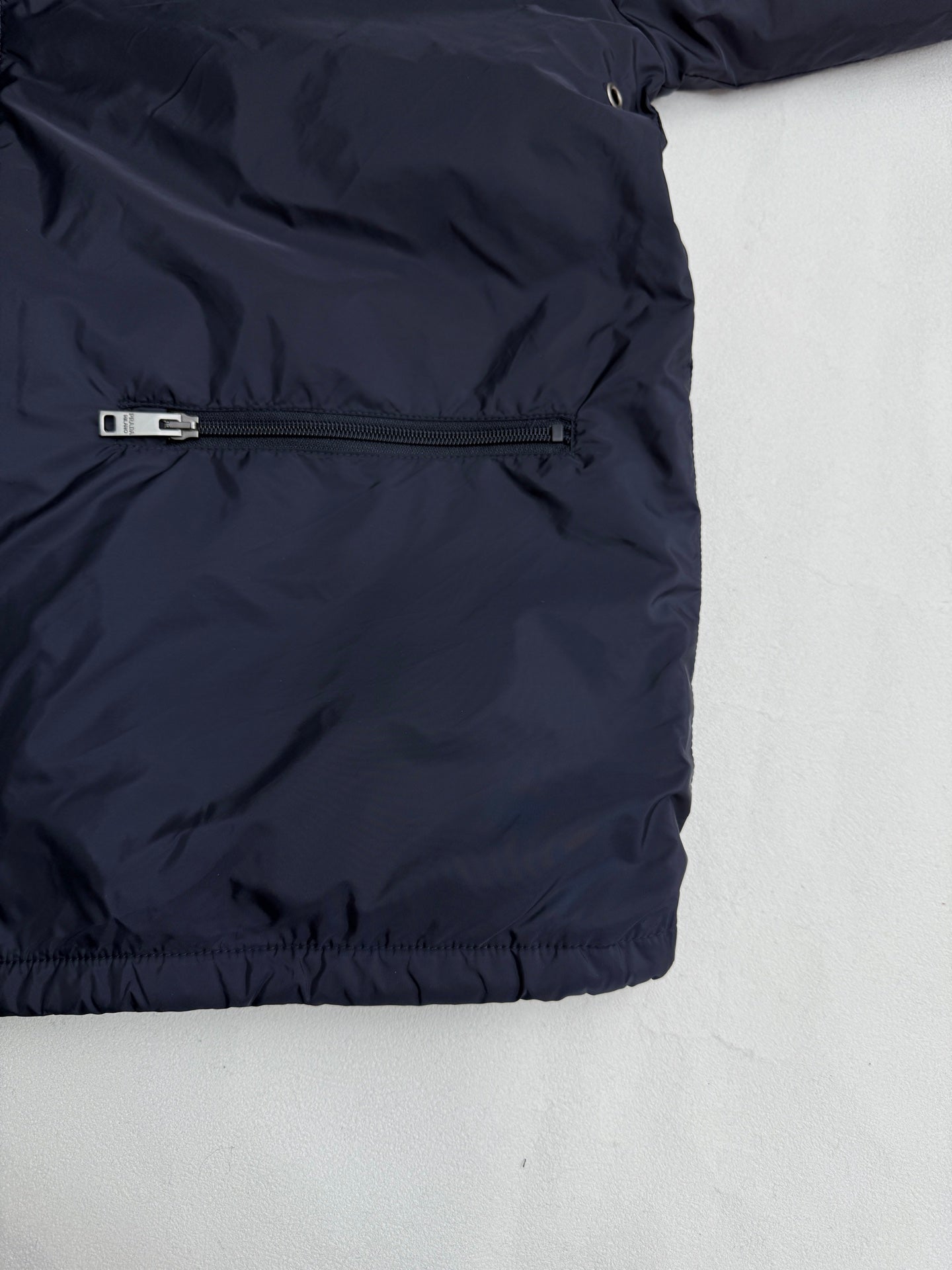Prada dark navy jacket side zipper pocket with drawcord hem
