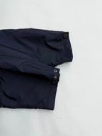Prada dark navy jacket cuff with snap buttons and folded sleeve hem