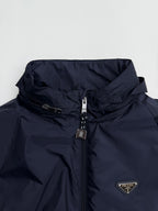 Prada dark navy hooded jacket, front zip and triangular logo patch