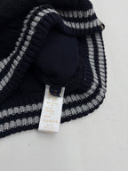 Louis Vuitton knit cardigan neckline with navy and gray striped trim and neck tag
