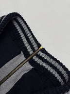 Louis Vuitton knit cardigan zipper area with navy stripes and gold zip pull