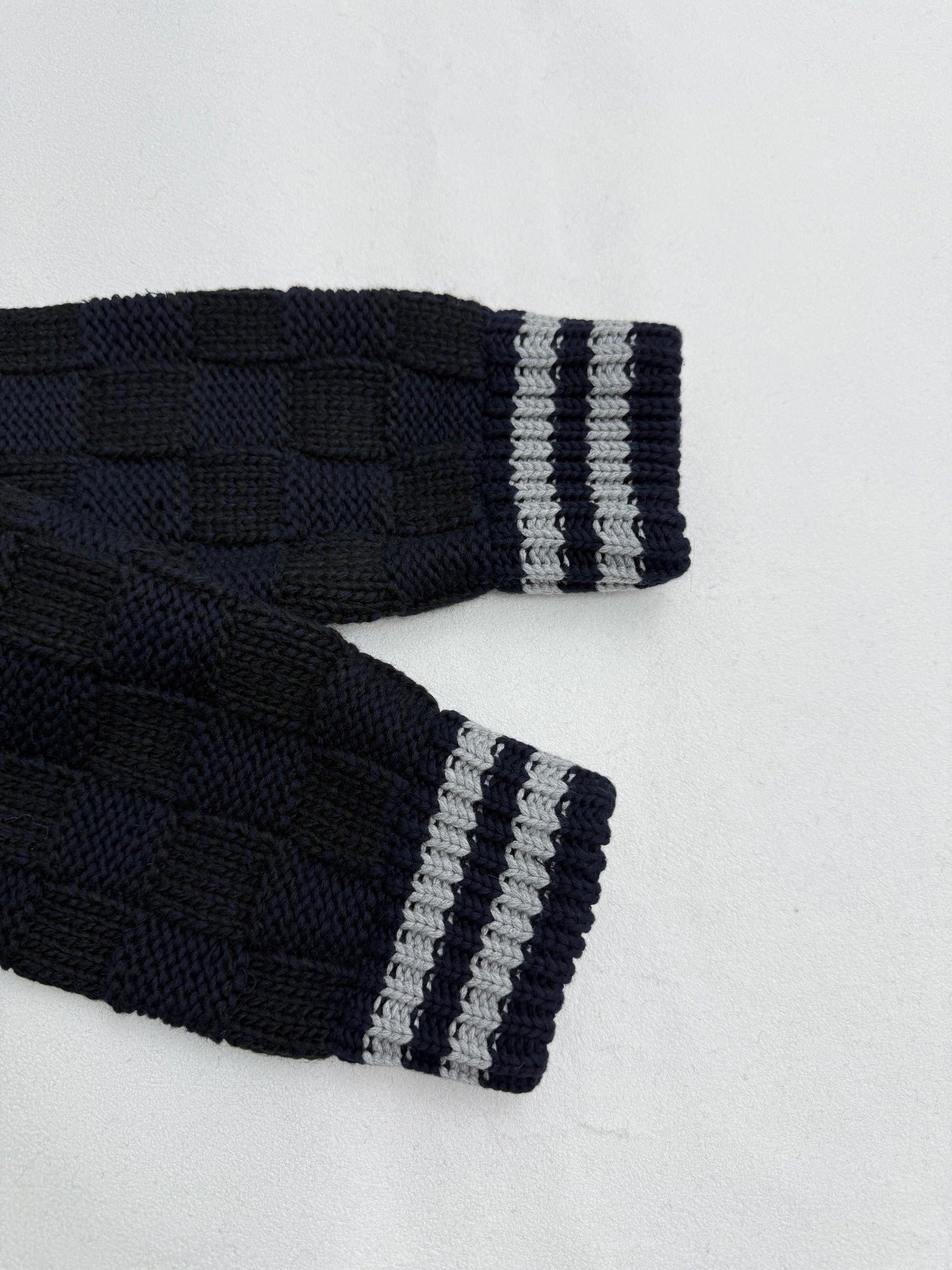 Louis Vuitton knit cardigan ribbed cuffs in navy with gray-and-white stripe bands