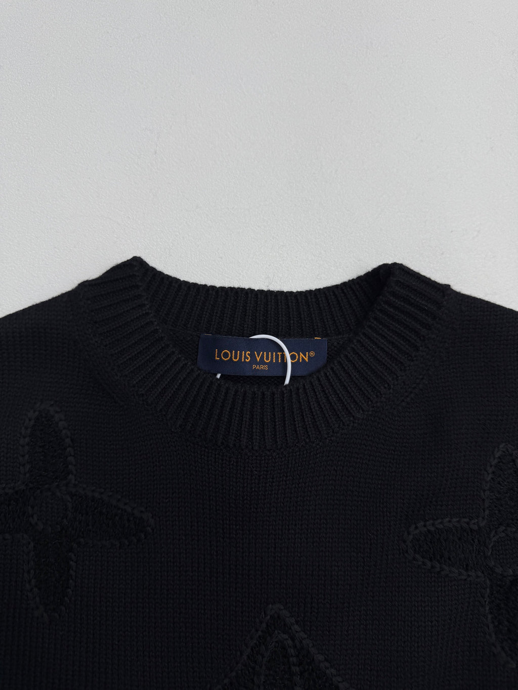 Louis Vuitton sweater neckline in dark rib knit with small monogram icons