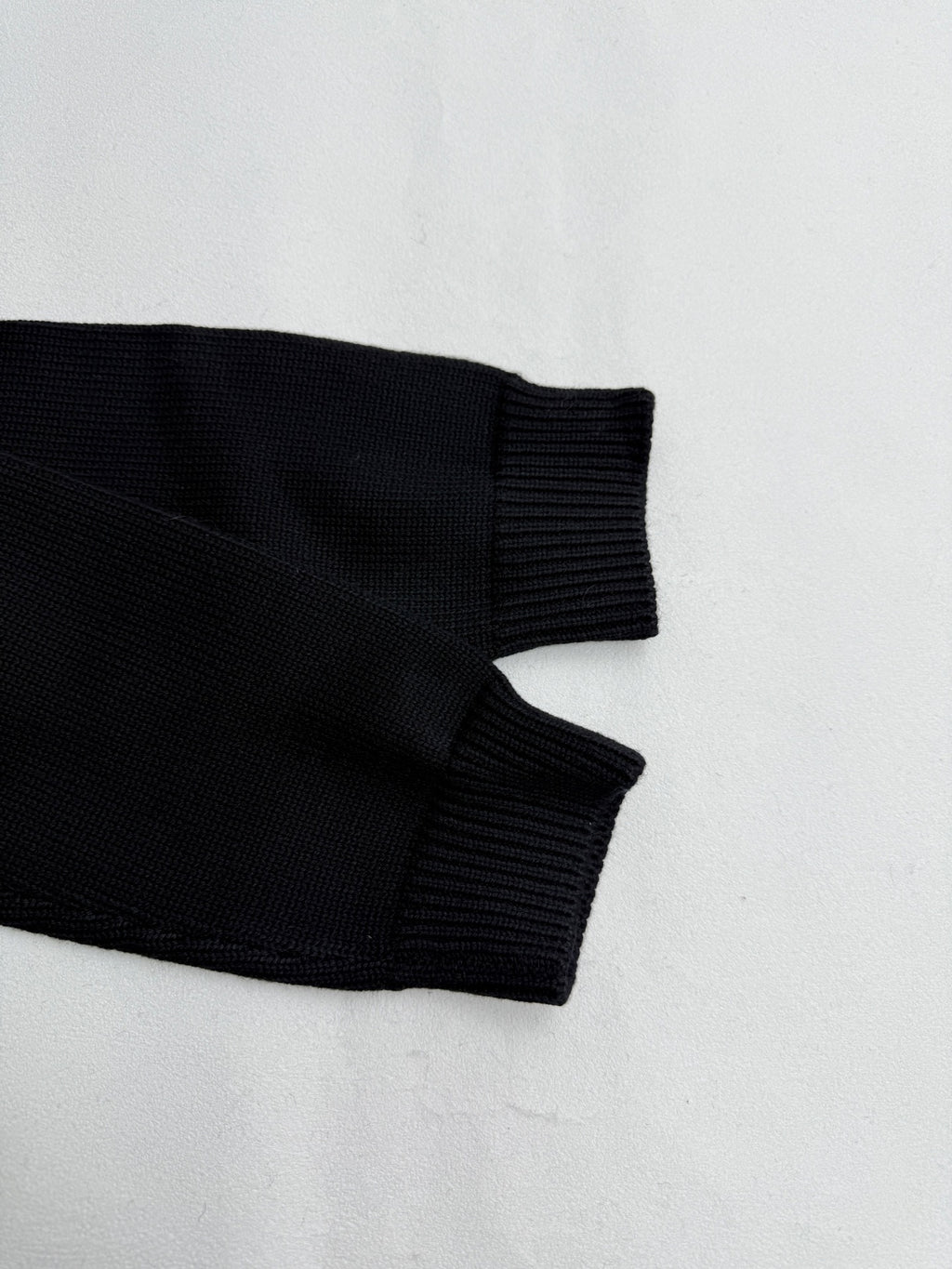 Louis Vuitton sweater hem and ribbed cuff in dark knit with rib texture