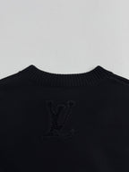 Louis Vuitton sweater back panel in dark knit with large LV monogram crest
