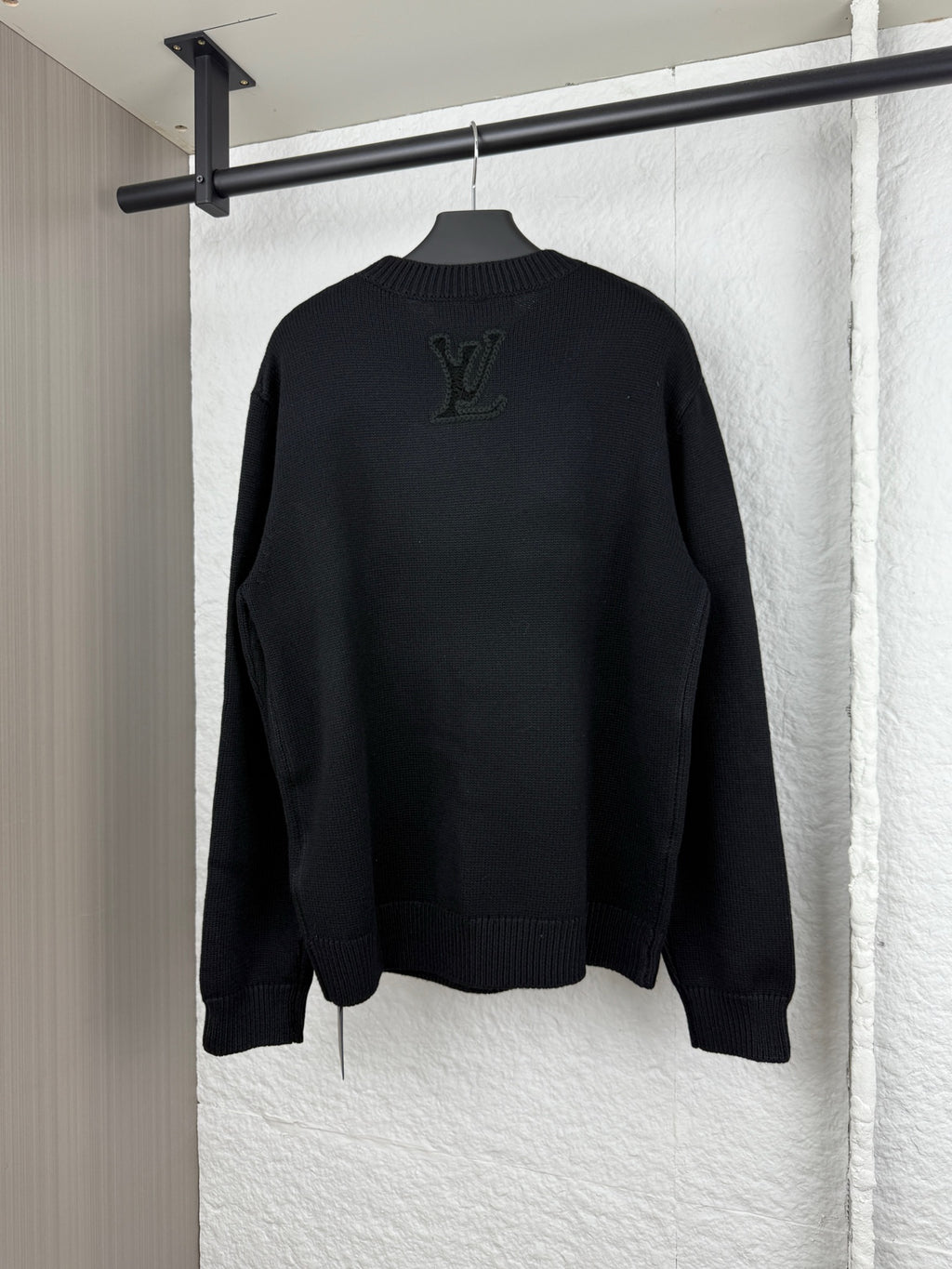 Louis Vuitton long-sleeve sweater, dark knit with large LV logo at back