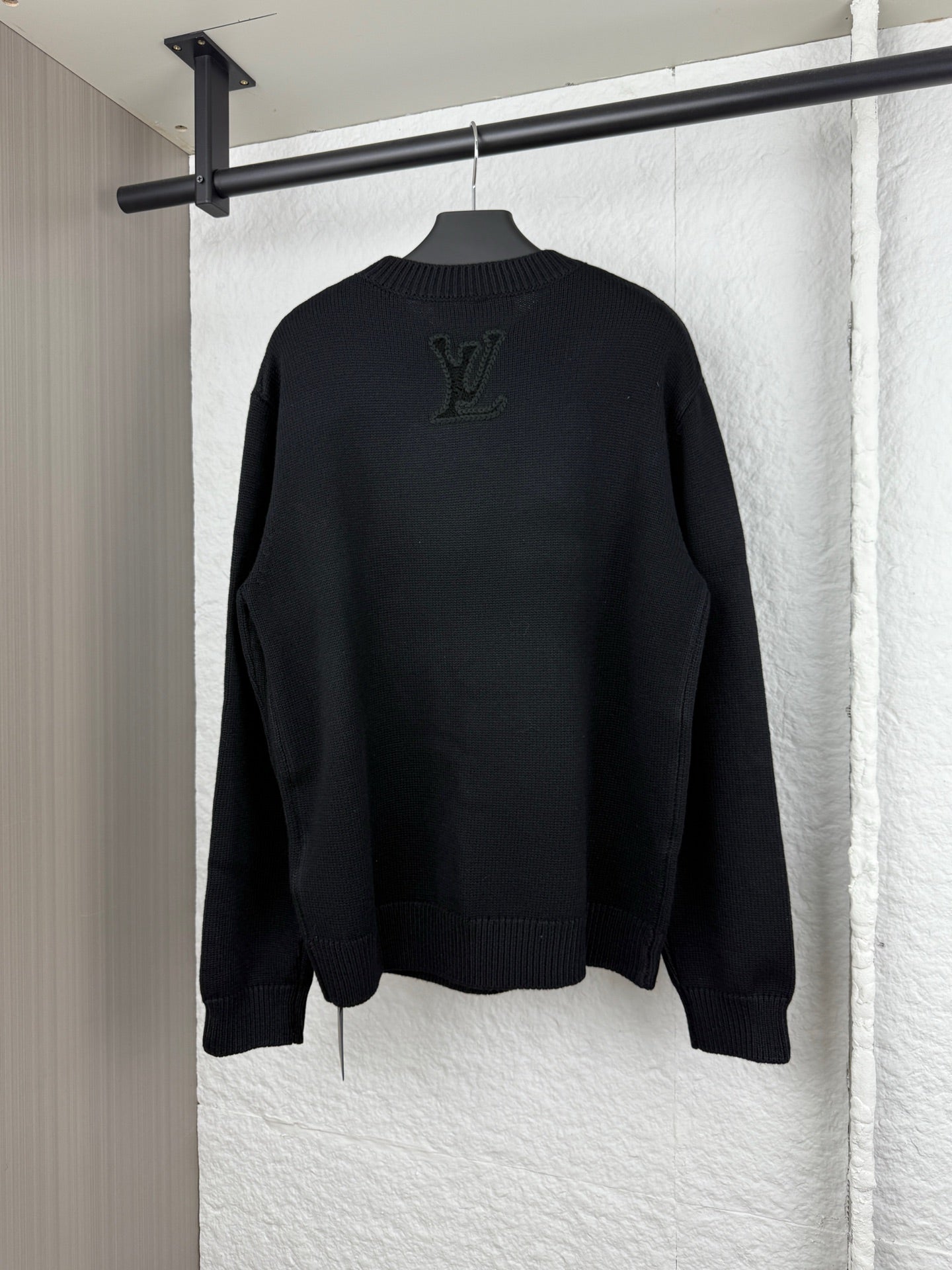 Louis Vuitton long-sleeve sweater, dark knit with large LV logo at back