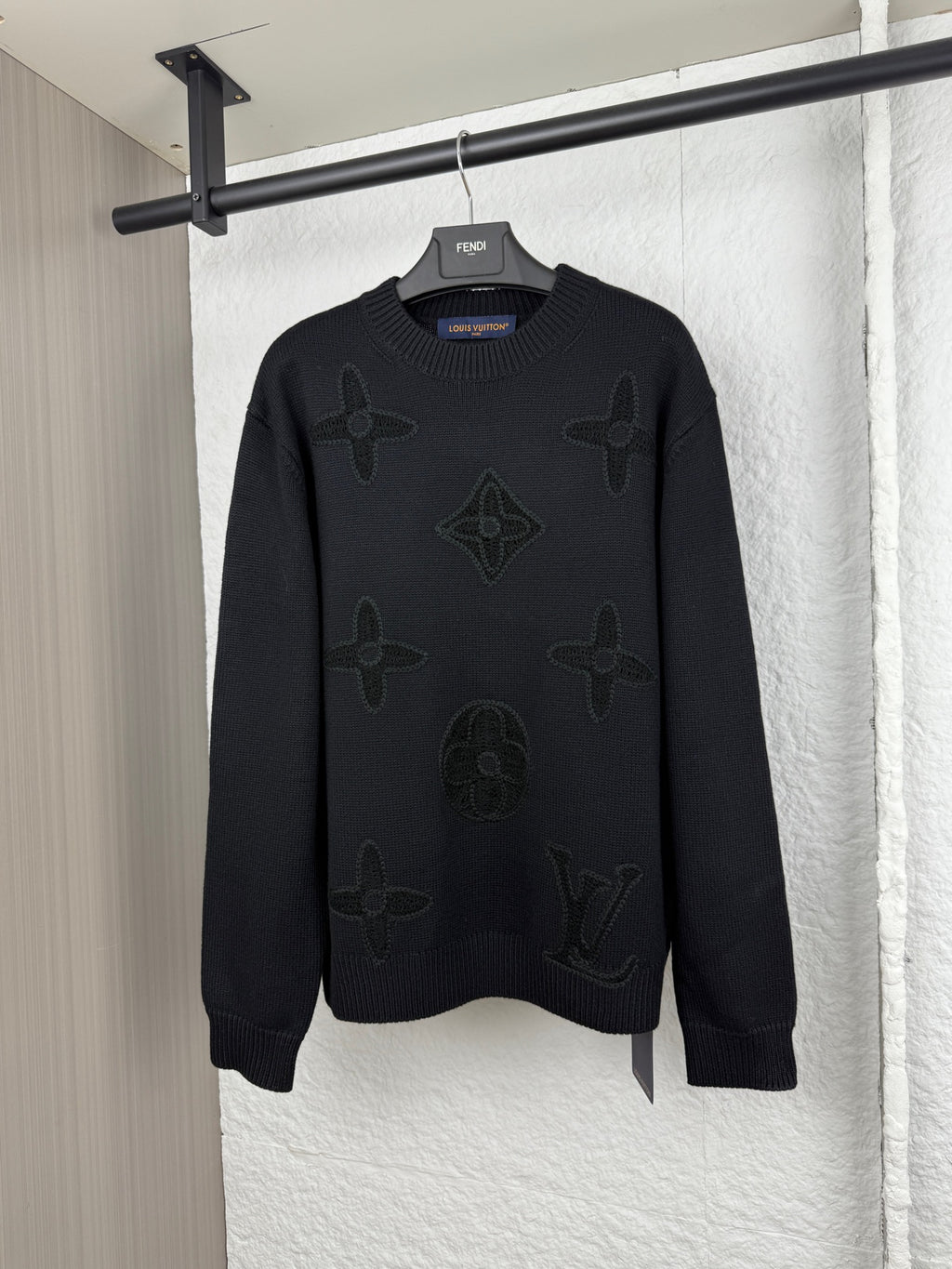 Louis Vuitton long-sleeve sweater in dark knit with embossed monogram pattern