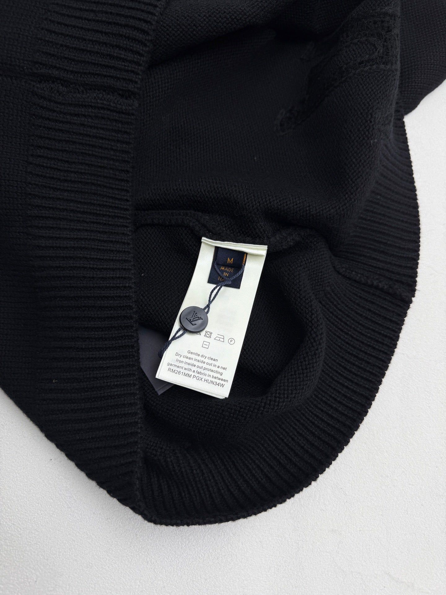 Louis Vuitton sweater with neck ribbing and woven size/care label at inner collar