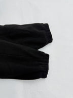 Black ribbed cuffs on hooded jacket sleeves