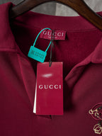 Burgundy polo sweatshirt with Gucci neck label and hang tags
