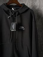 Black Balenciaga zip hoodie with hood and front pocket, chest logo