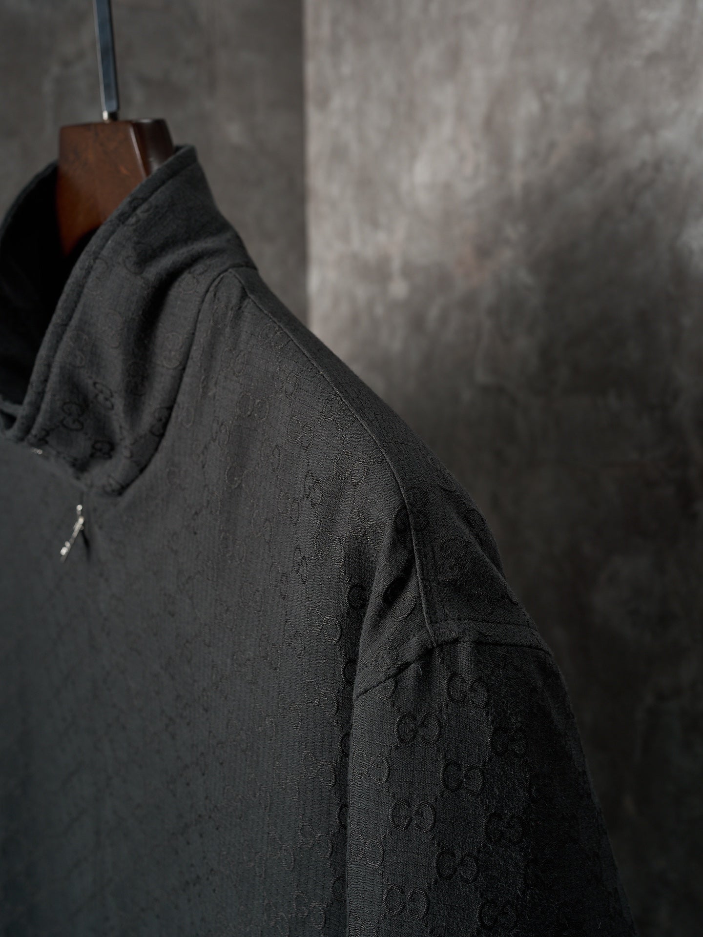 Long jacket shoulder and sleeve in dark GG pattern with zipper-trim pocket