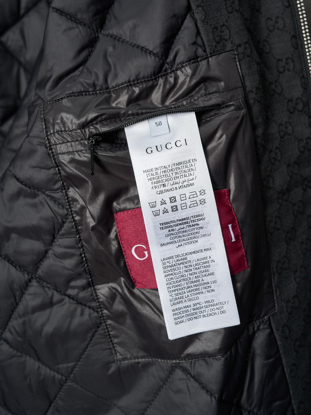 Long jacket inner quilt lining with care label and Gucci branding tag