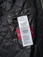 Long jacket inner quilt lining with care label and Gucci branding tag