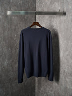Navy knit long-sleeve sweater back view with ribbed hem and cuffs