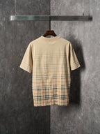 Beige short-sleeve T-shirt with check plaid graphic across the back