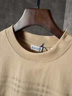 Beige crew-neck short-sleeve T-shirt with Burberry logo label at the collar