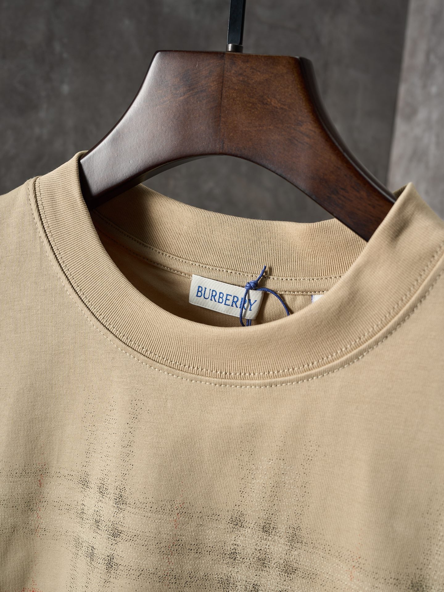 Beige crew-neck short-sleeve T-shirt with Burberry logo label at the collar