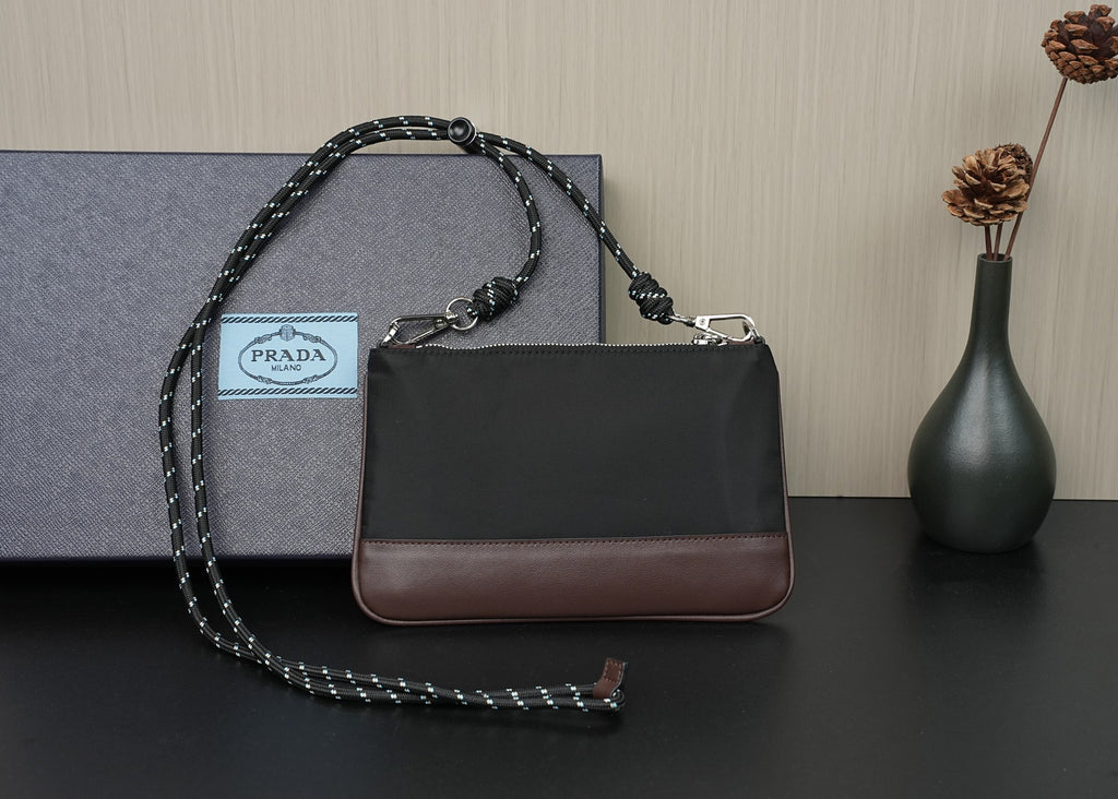 Prada shoulder bag, black with brown bottom panel, chain strap and top handle
