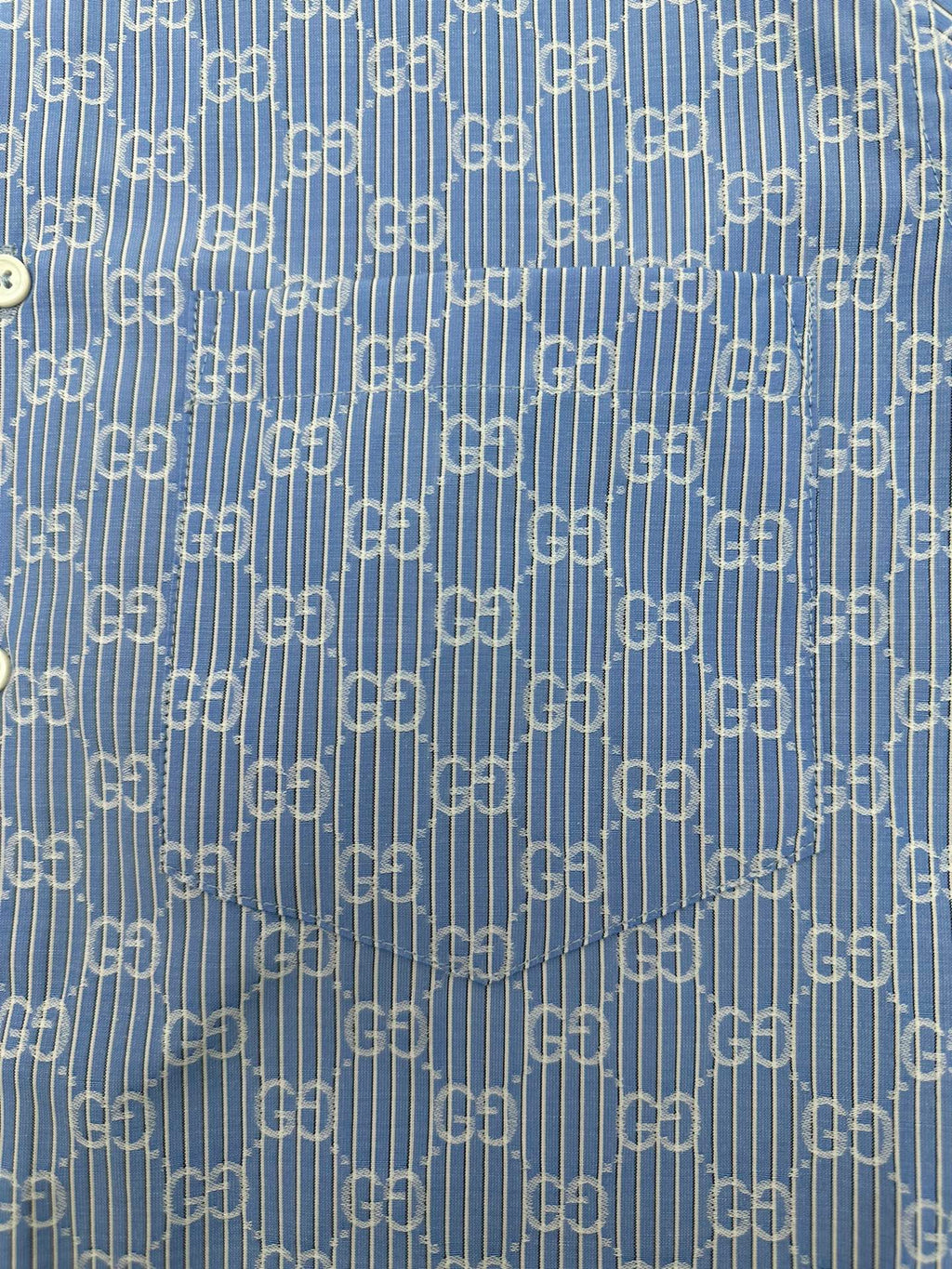 Blue Gucci GG monogram patterned fabric with fine vertical stripes