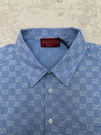 Blue Gucci shirt collar and front placket with GG monogram pattern and buttons
