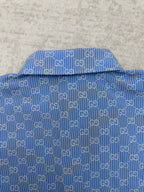 Blue Gucci shirt neckline with GG monogram pattern and button placket