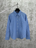 Blue Gucci long-sleeve button-up shirt with allover GG pattern and pointed collar