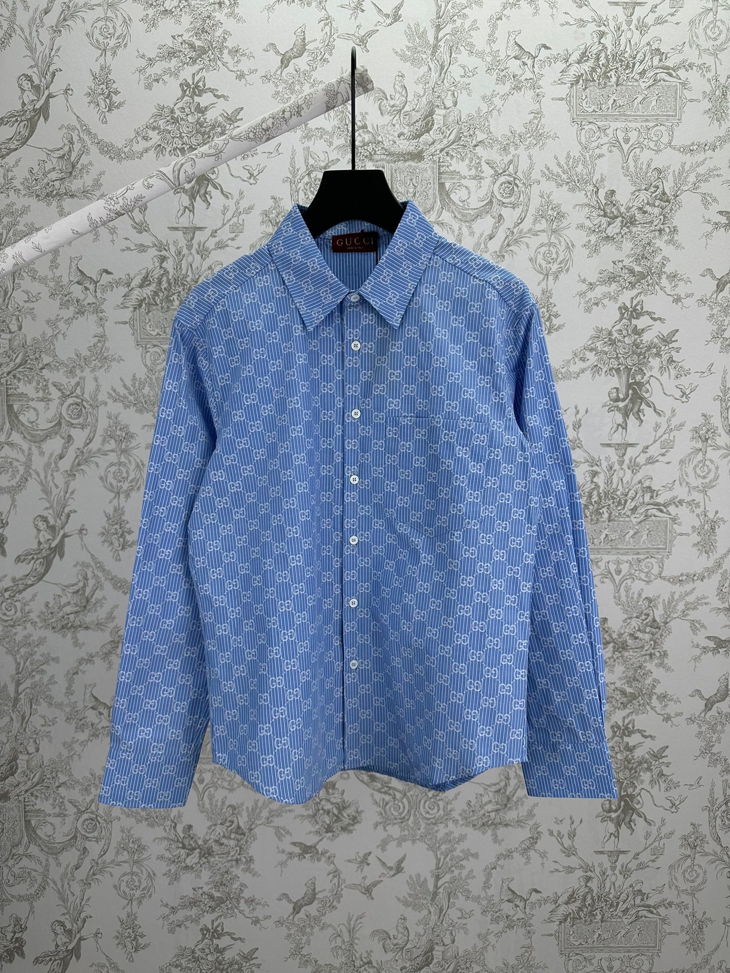 Blue Gucci long-sleeve button-up shirt with allover GG pattern and pointed collar