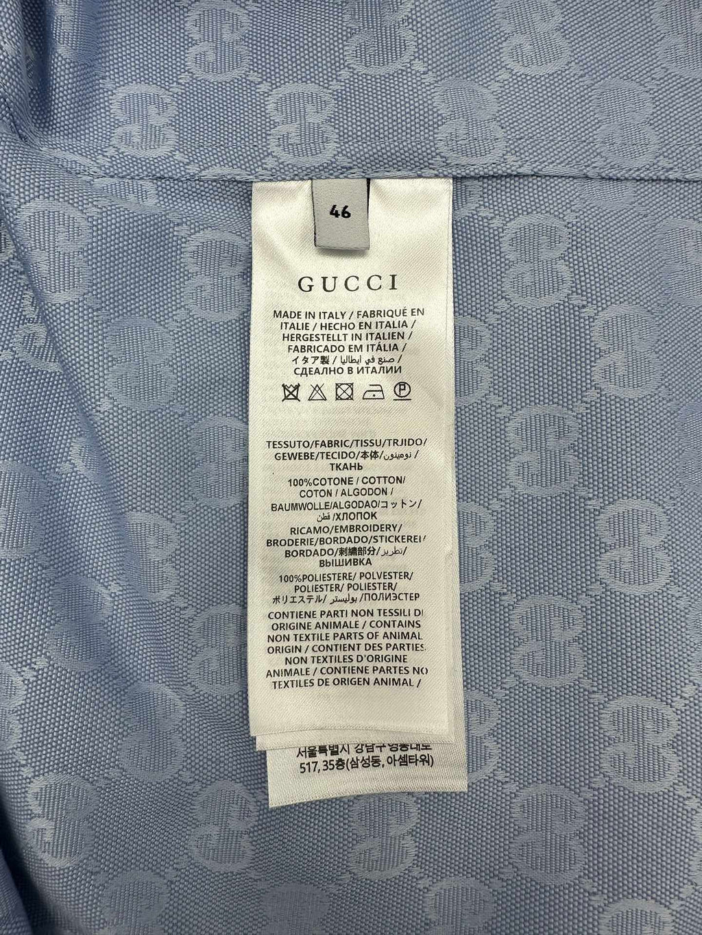 Gucci fabric care label inside light blue shirt, size 46