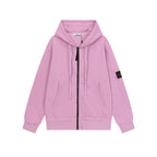 Stone Island zip-up hoodie in light pink with hood and black front zipper.