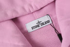 Stone Island size label inside light pink hoodie collar.